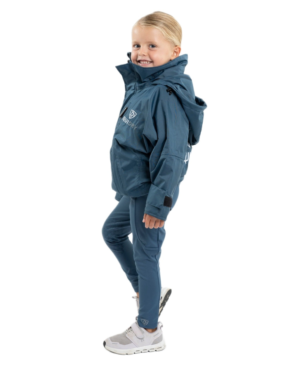 Steel Blue coloured Equidry Childrens Shortie Jacket on white background 