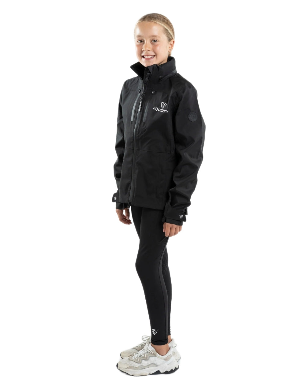 Black coloured Equidry Childrens Varsha Waterproof Jacket on white background 