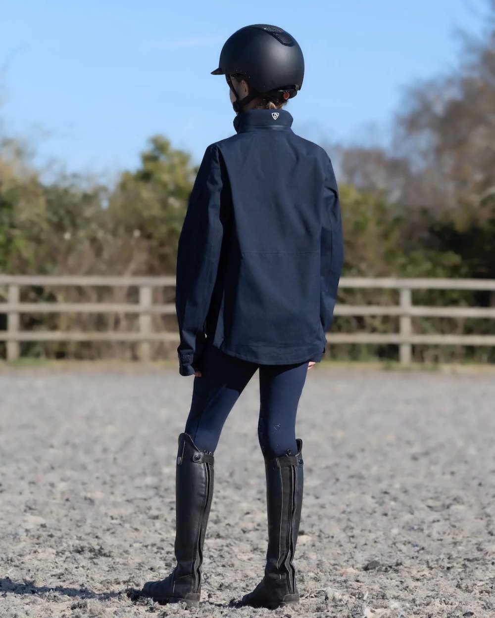 Navy Equidry Childrens Varsha Waterproof Jacket on outdoor background 