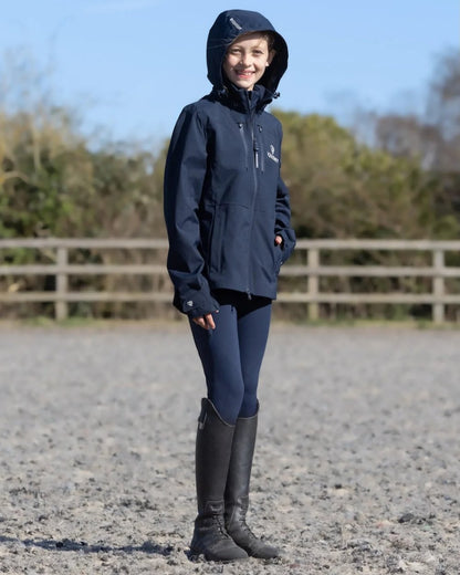 Navy Equidry Childrens Varsha Waterproof Jacket on outdoor background 
