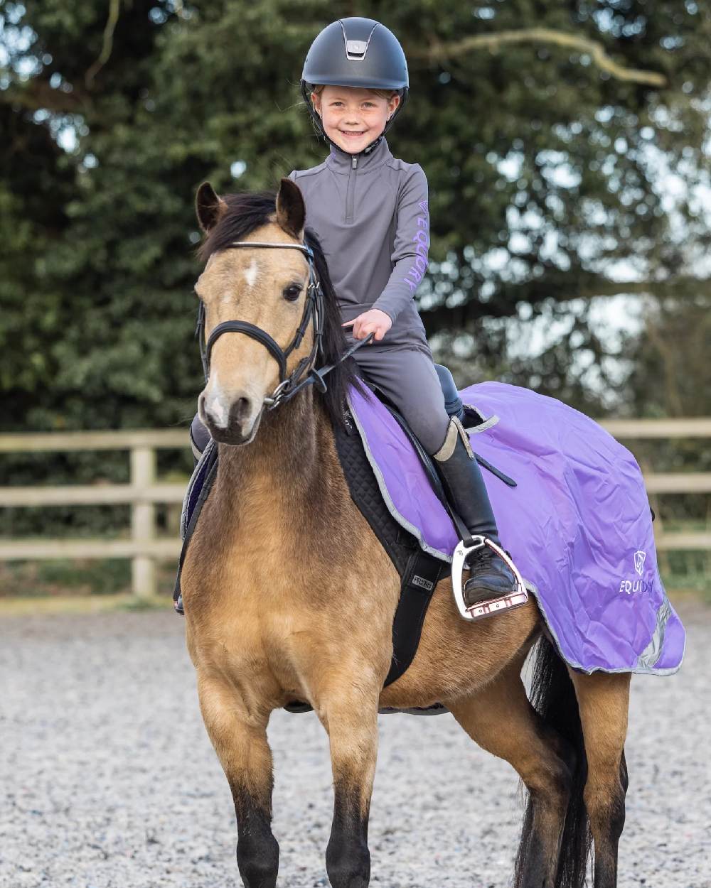Grey Lilac Coloured Equidry Childrens Water Repellent Base Layer on outdoor background 