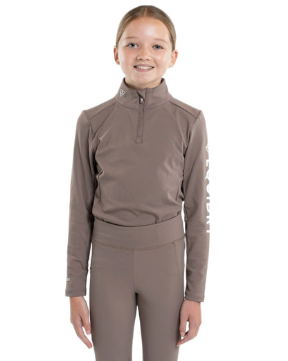 Mocha White Coloured Equidry Childrens Water Repellent Base Layer on white background 