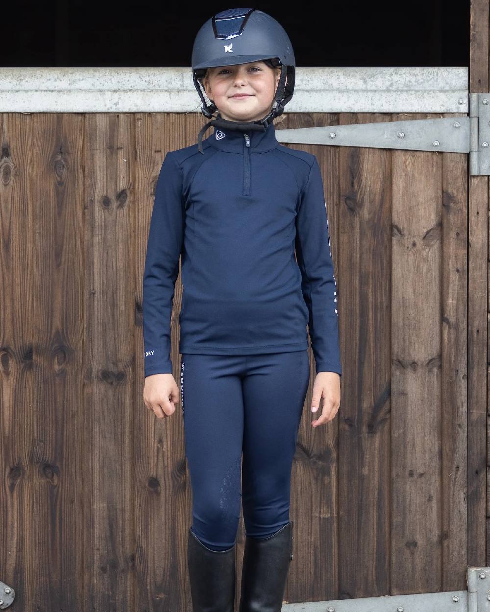 Navy White Coloured Equidry Childrens Water Repellent Base Layer on outdoor background 