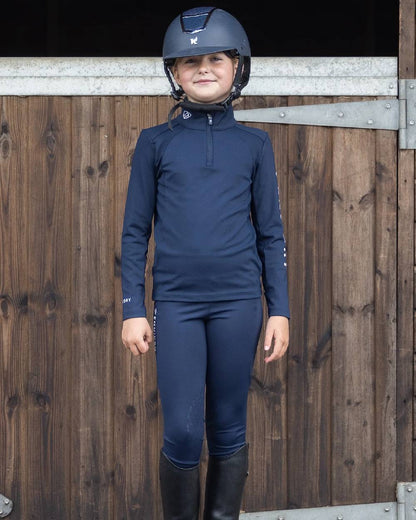 Navy White Coloured Equidry Childrens Water Repellent Base Layer on outdoor background 