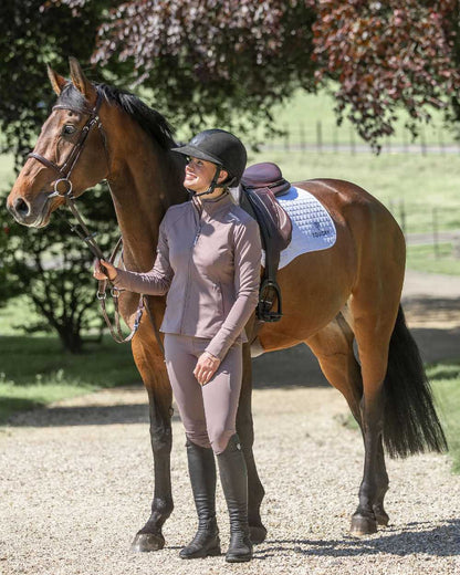 Mocha White Coloured Equidry Childrens Water Repellent Full Seat Leggings on outdoor background 