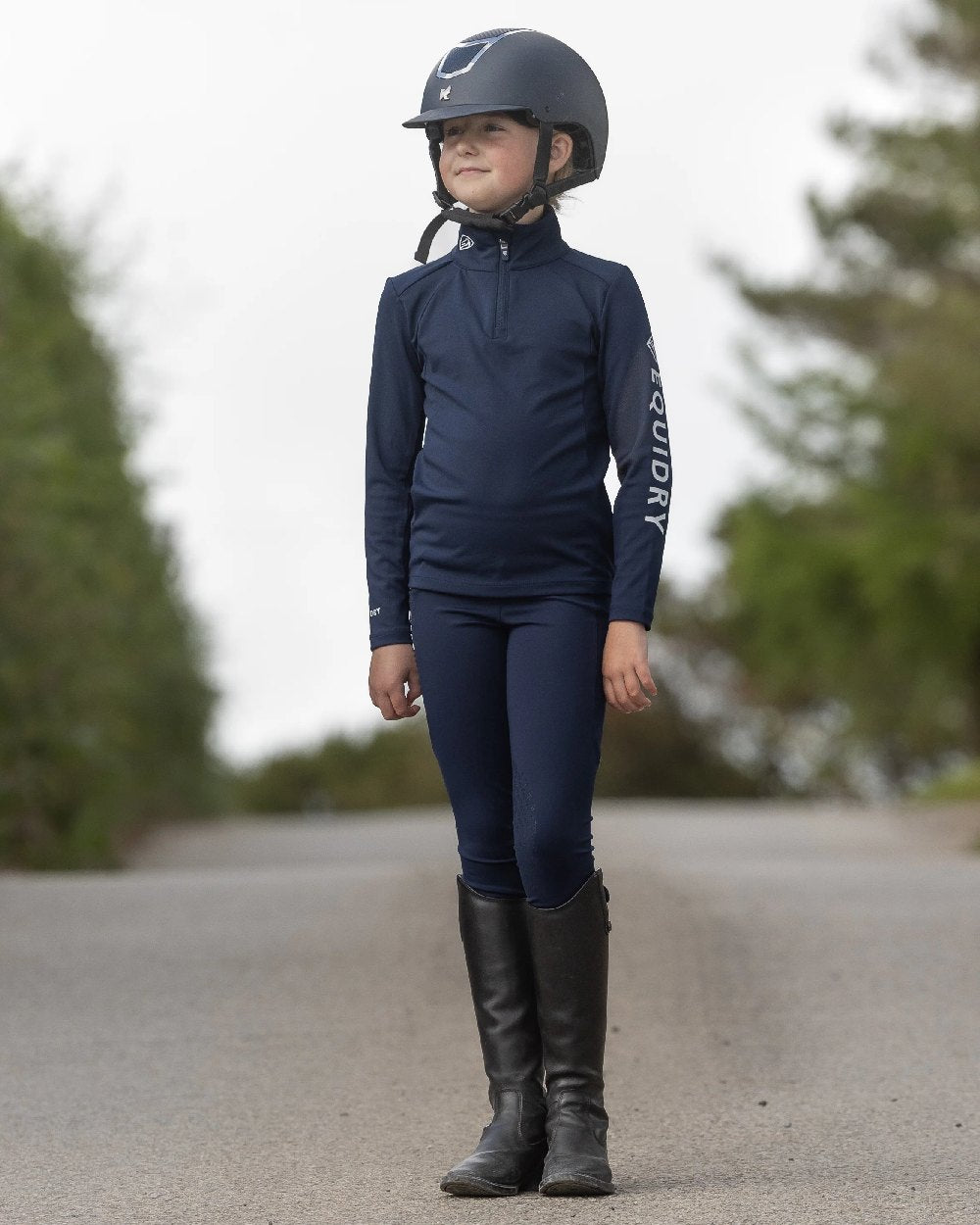 Navy Pink Coloured Equidry Childrens Water Repellent Full Seat Leggings on outdoor background 