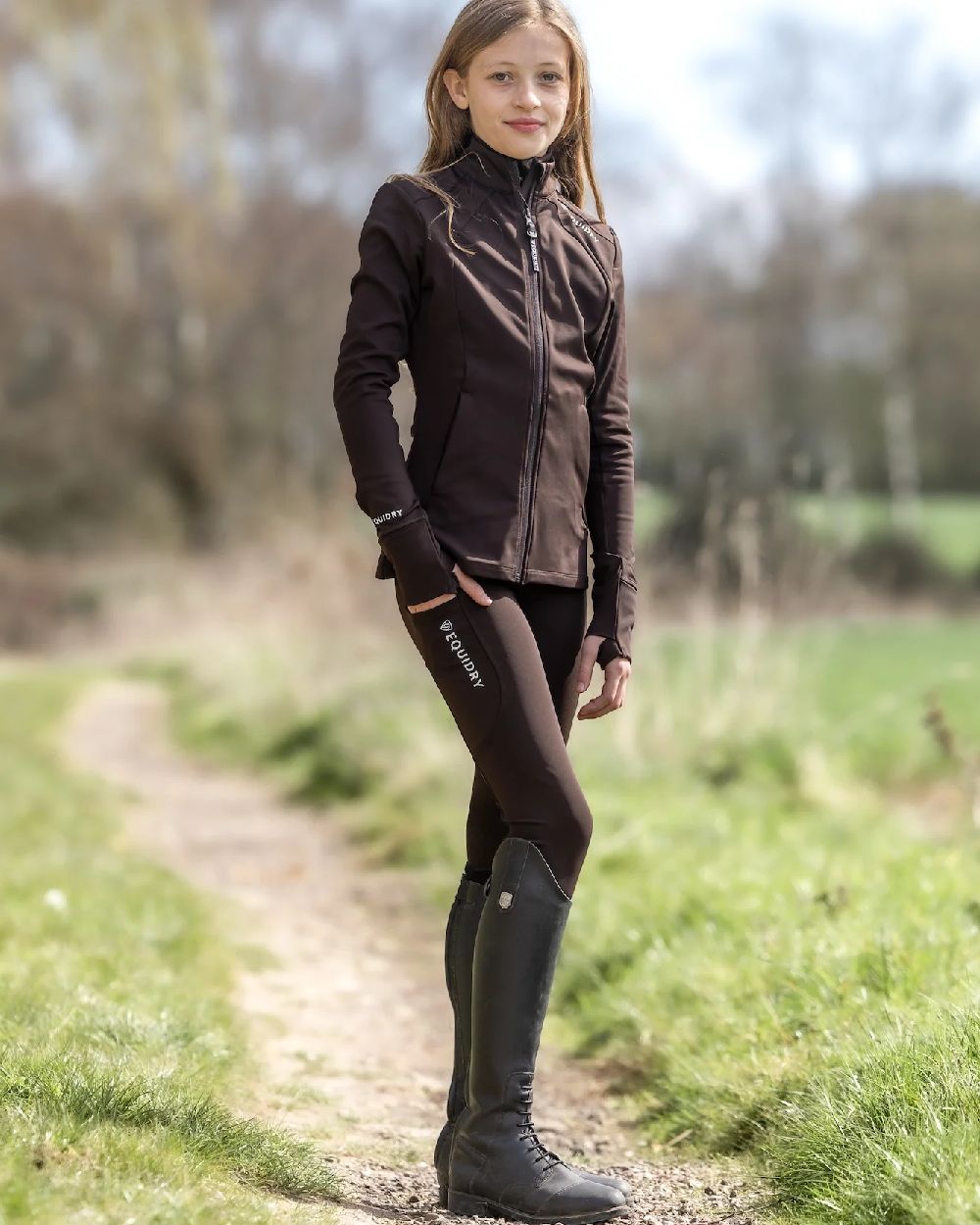 Brown White Coloured Equidry Childrens Water Repellent Knee Grip Leggings on outdoor background 