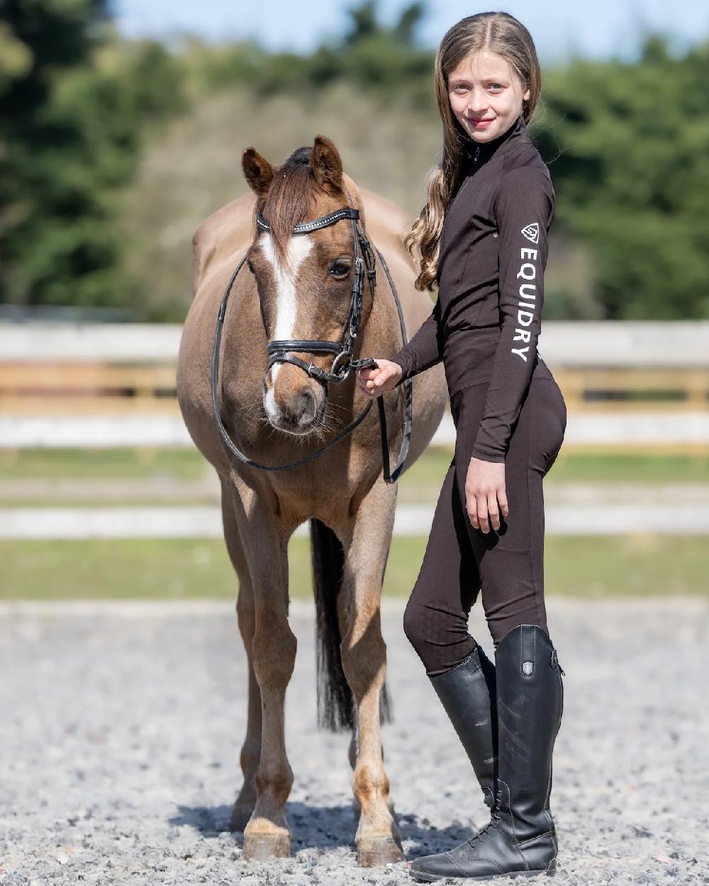 Brown White Coloured Equidry Childrens Water Repellent Knee Grip Leggings on outdoor background 