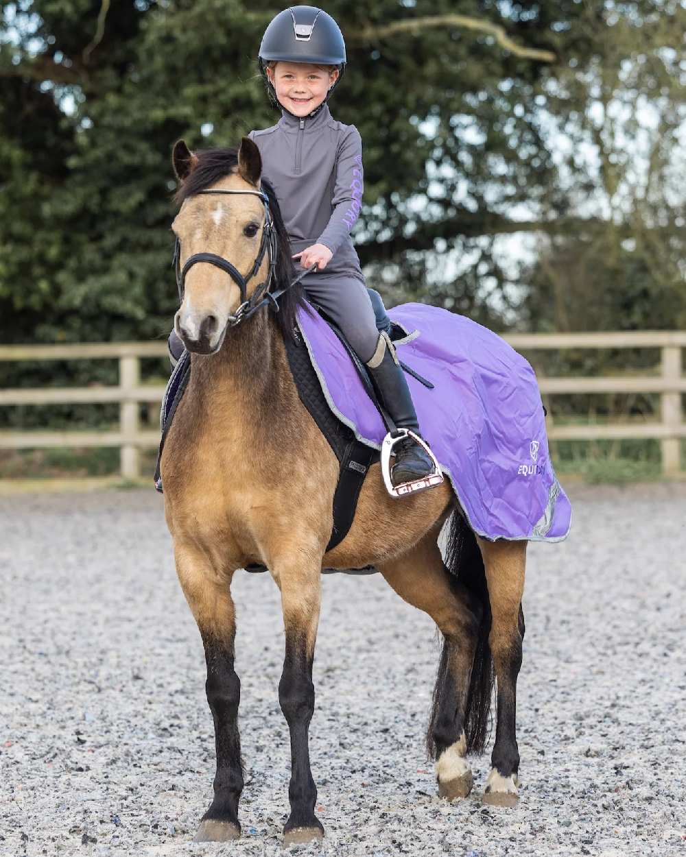 Grey Lilac Coloured Equidry Childrens Water Repellent Knee Grip Leggings on outdoor background 