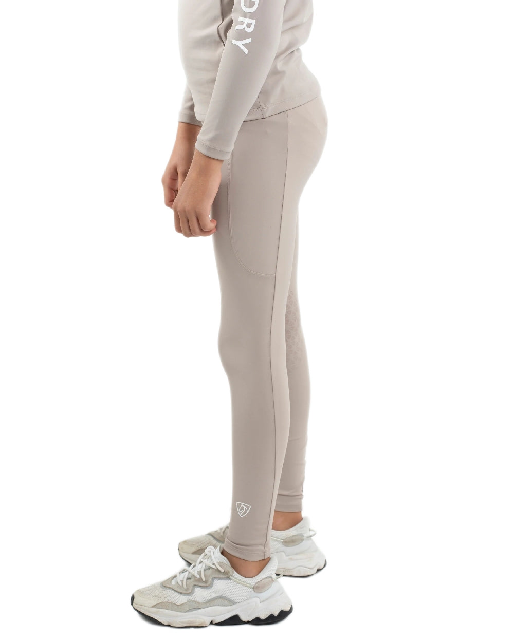 Sand White Coloured Equidry Childrens Water Repellent Knee Grip Leggings on white background 