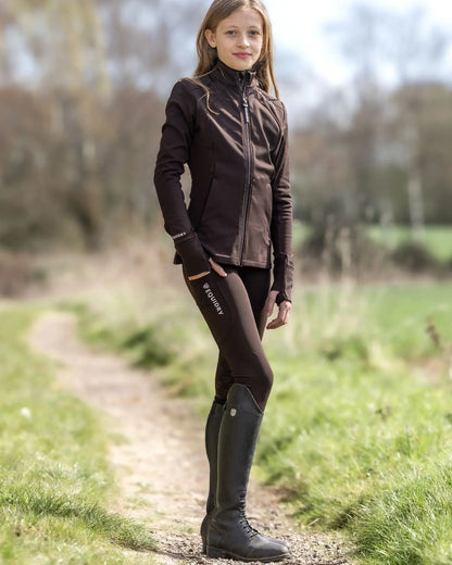 Brown White Coloured Equidry Childrens Water Repellent Zip Up Top on outdoor background 