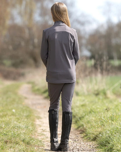 Grey White Coloured Equidry Childrens Water Repellent Zip Up Top on outdoor background 