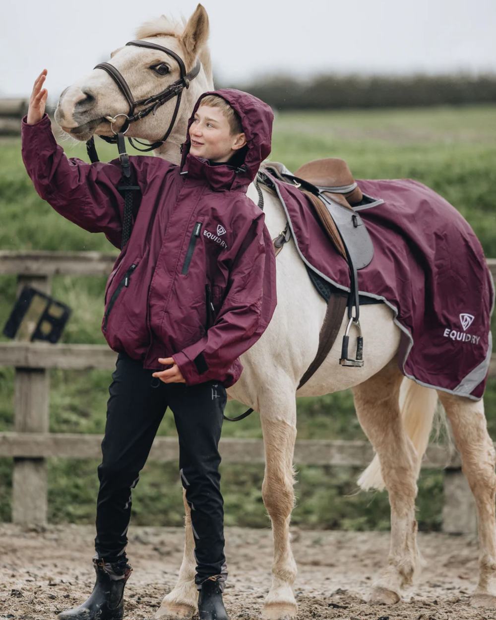 Plum coloured Equidry Waterproof Lite Fleece Lined Exercise Sheet on outdoor background 