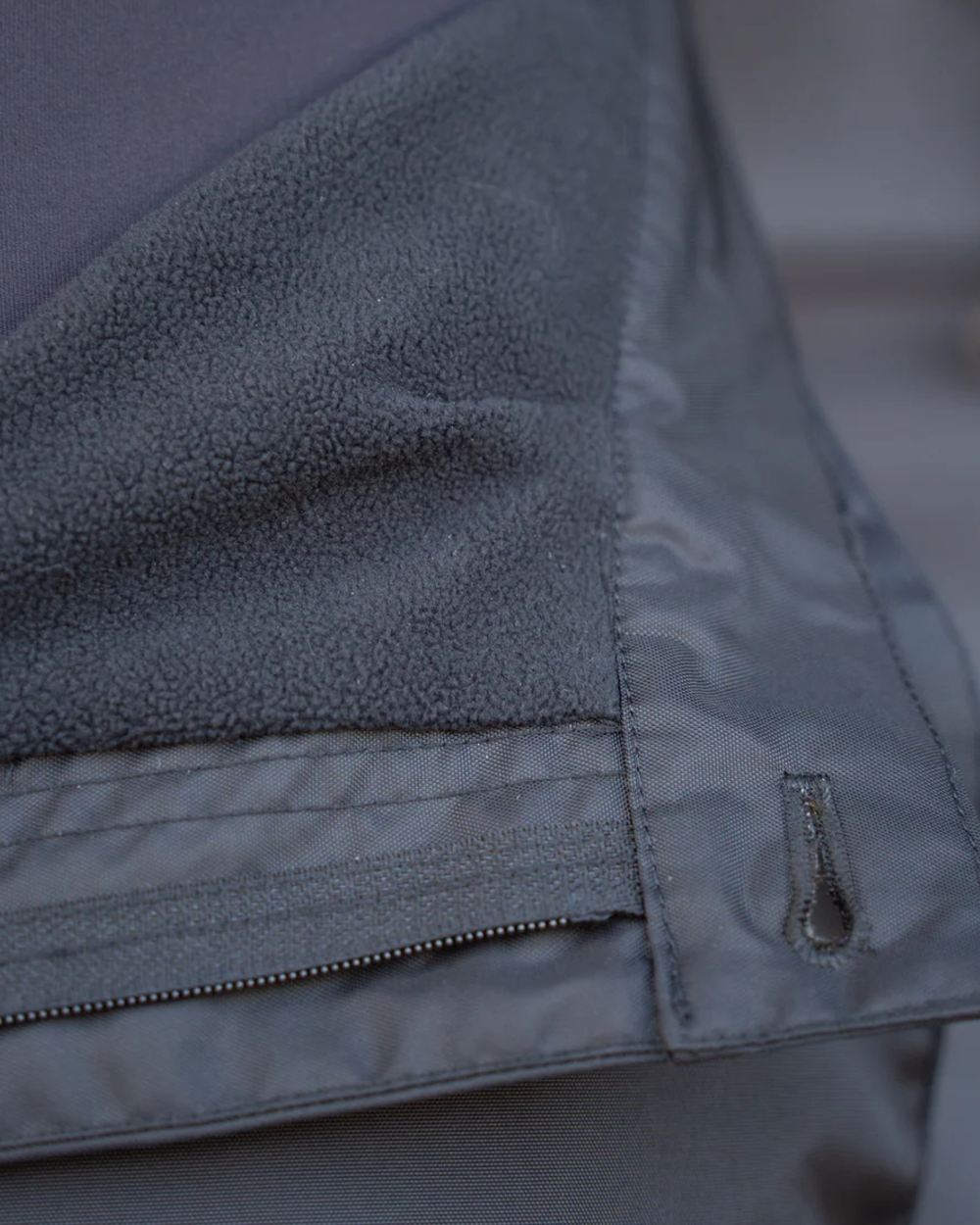 Black coloured Equidry Mens Fleece Lined Waterproof Trousers on outdoor background 