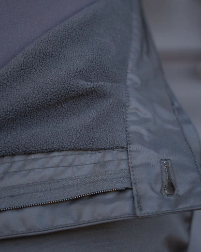 Black coloured Equidry Mens Fleece Lined Waterproof Trousers on outdoor background 