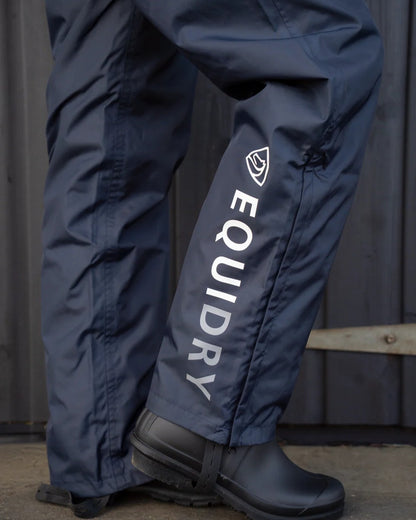 Navy coloured Equidry Mens Fleece Lined Waterproof Trousers on outdoor background 