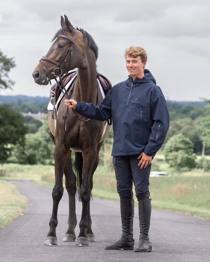 Navy coloured Equidry Mens Storm Smock With Velour Lining on outdoor background 