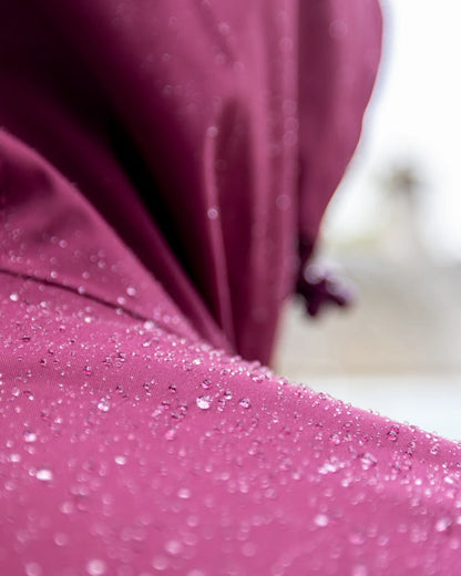Plum coloured Equidry Mens Storm Smock With Velour Lining on outdoor background 