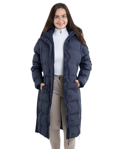 Navy coloured Equidry Thora Waterproof Riding Puffer Coat With Hood on white background 
