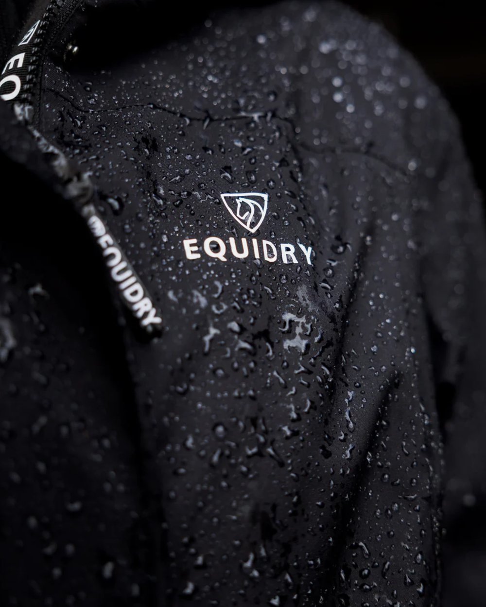 Black coloured Equidry Womens Bronte Riding Coat on white background 