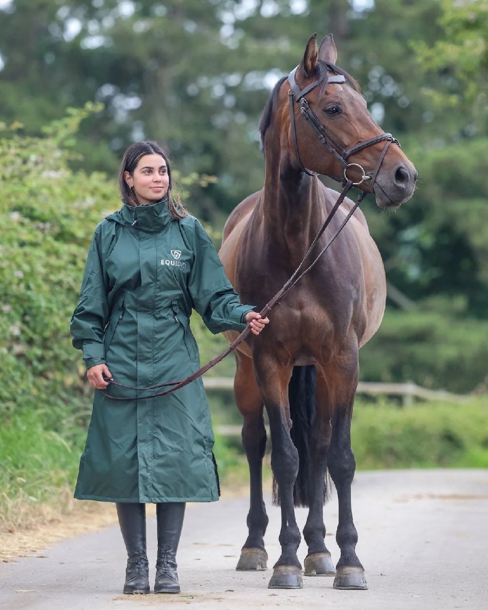 Black Forest Green coloured Equidry Womens Equimac Evolution Jacket on steet background  