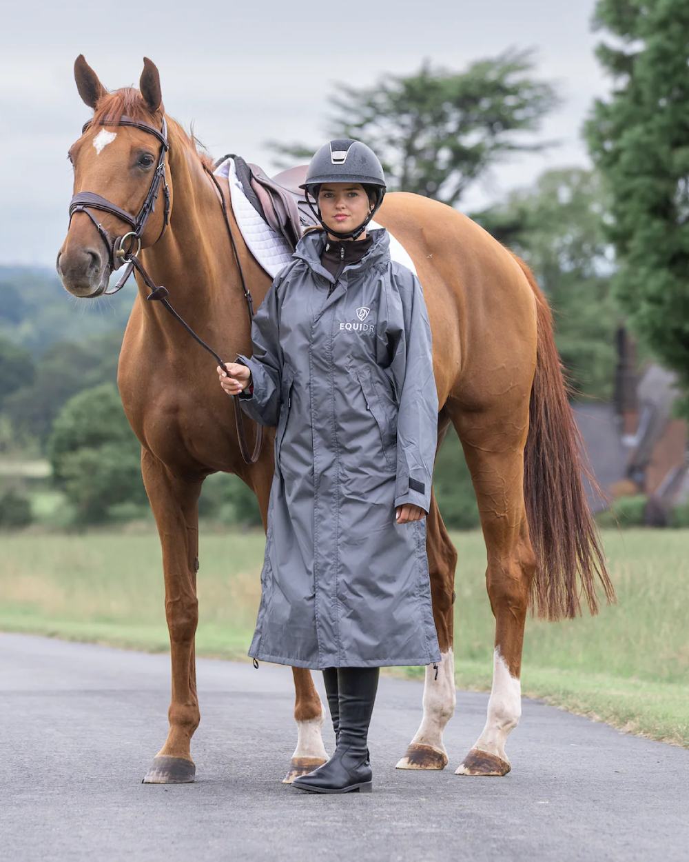 Charcoal Grey coloured Equidry Womens Equimac Evolution Jacket on street background  