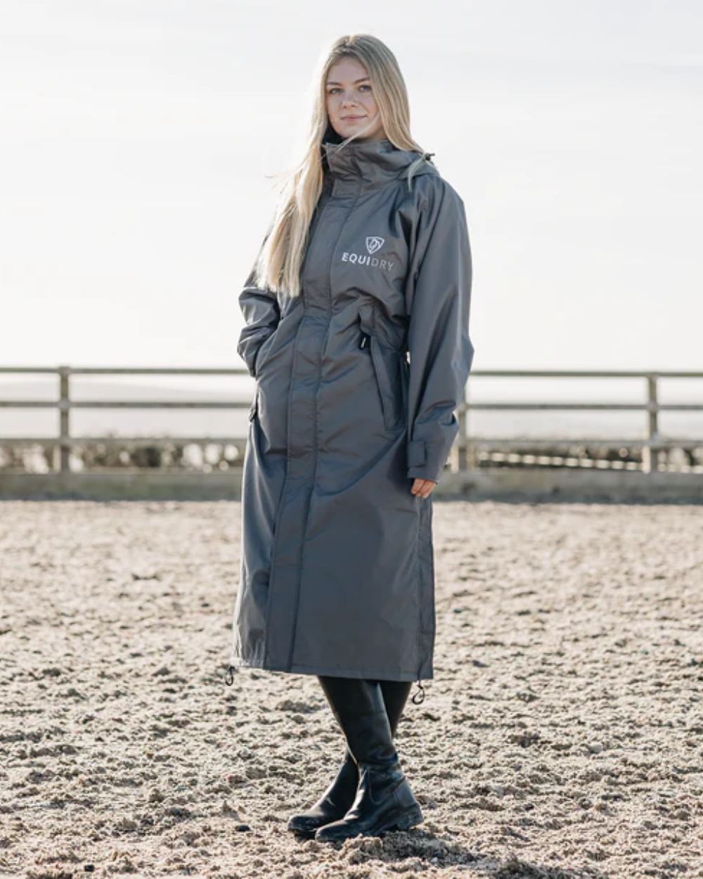 Charcoal Grey coloured Equidry Womens Equimac Evolution Jacket on farm background  
