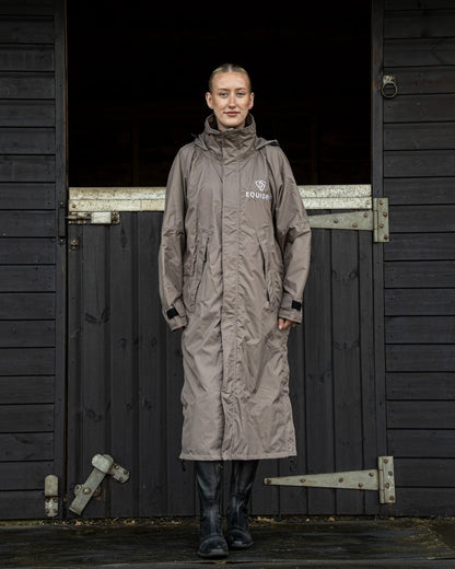 Mocha coloured Equidry Womens Equimac Evolution Jacket on Stable background  