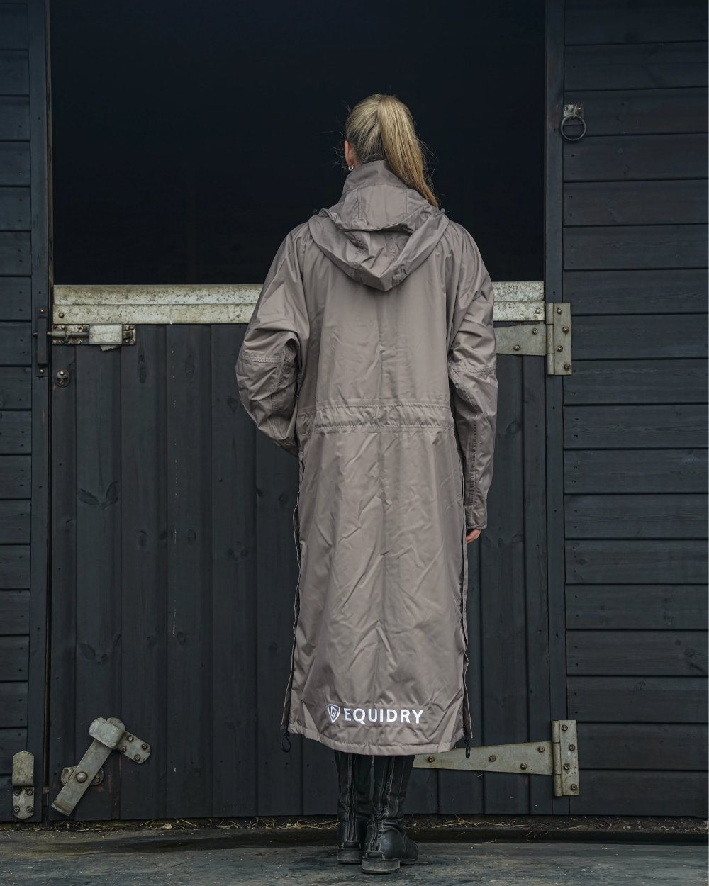 Taupe coloured Equidry Womens Equimac Evolution Jacket on stable background  