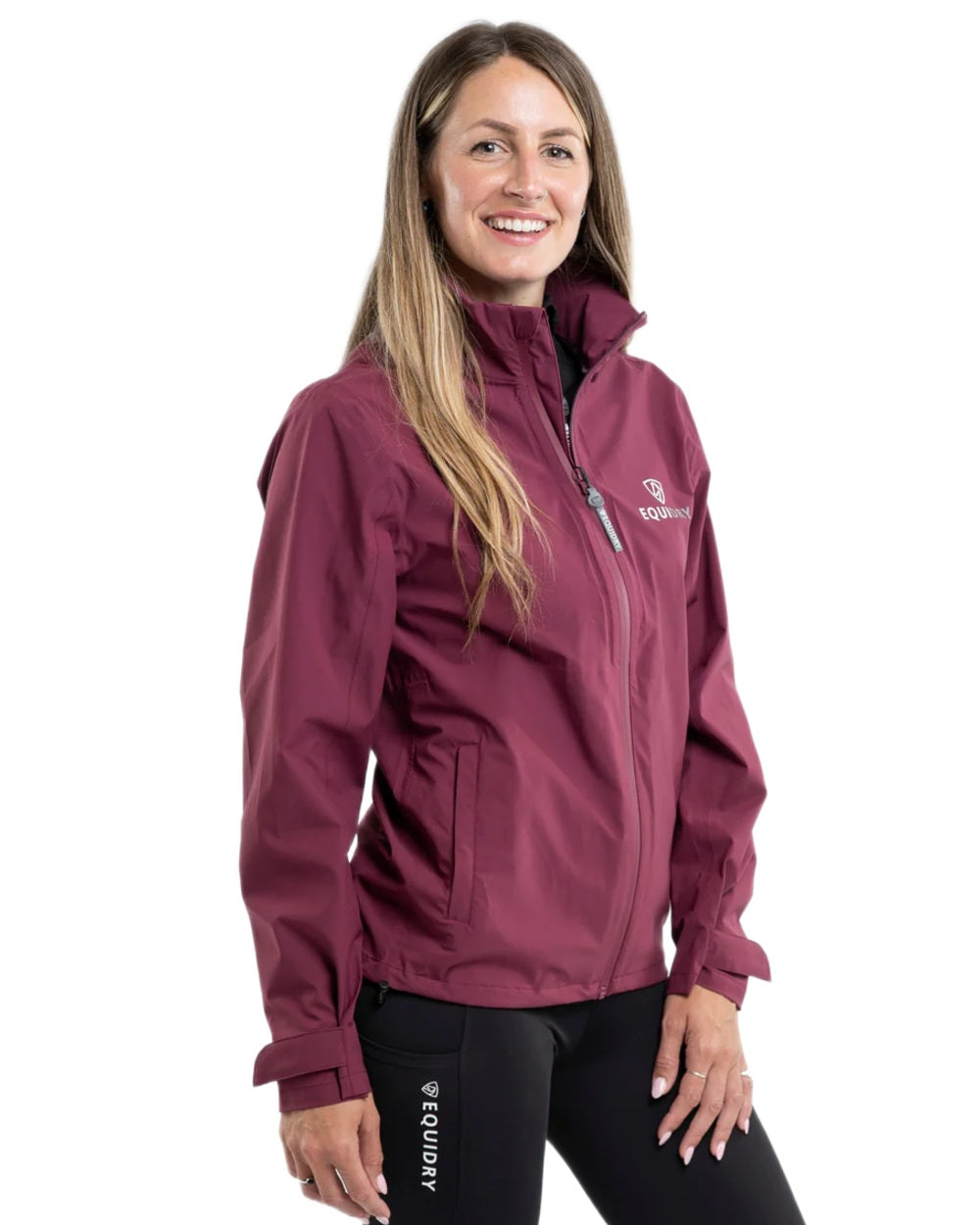 Plum coloured Equidry Womens Nimbus Pack Away Jacket with Stowaway Hood on white background 
