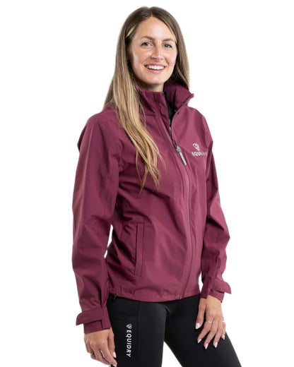 Plum coloured Equidry Womens Nimbus Pack Away Jacket with Stowaway Hood on white background 
