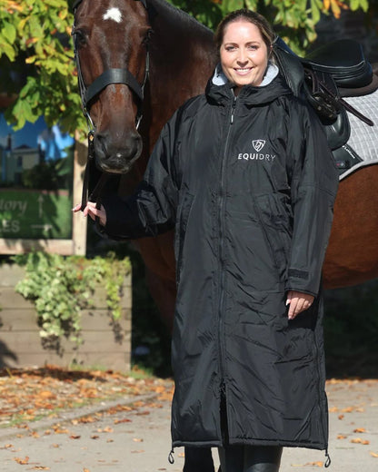 Black coloured Equidry Womens Original All Rounder Waterproof Coat on outdoor background 