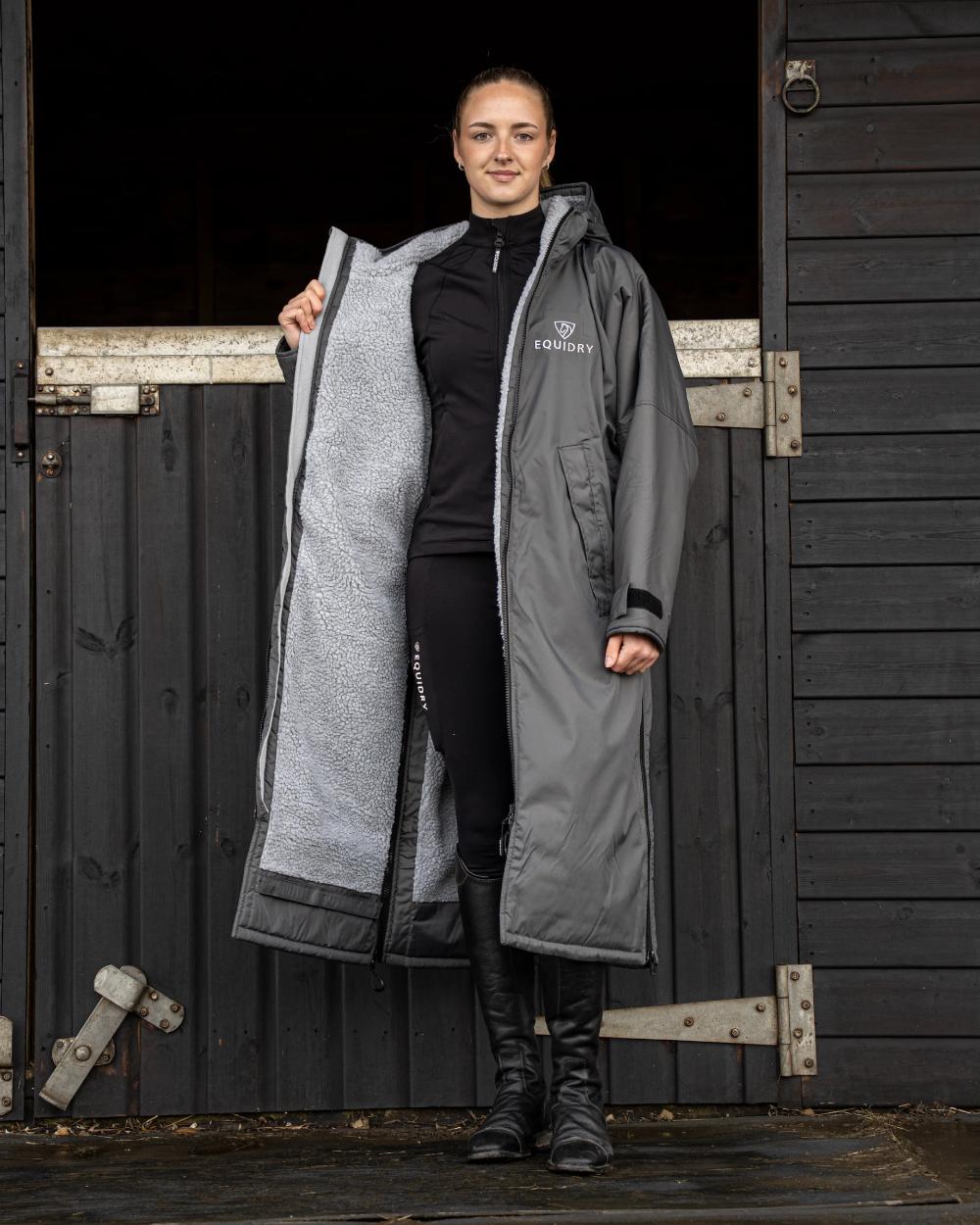 Charcoal Grey coloured Equidry Womens Original All Rounder Waterproof Coat on outdoor background 