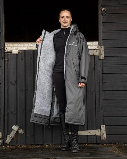 Charcoal Grey coloured Equidry Womens Original All Rounder Waterproof Coat on outdoor background 