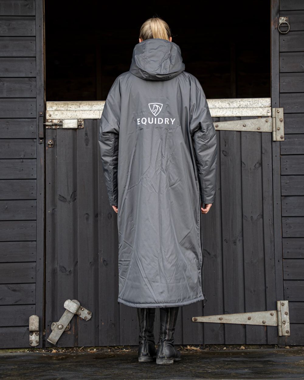 Charcoal Grey coloured Equidry Womens Original All Rounder Waterproof Coat on outdoor background 