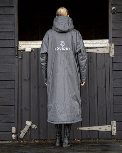 Charcoal Grey coloured Equidry Womens Original All Rounder Waterproof Coat on outdoor background 
