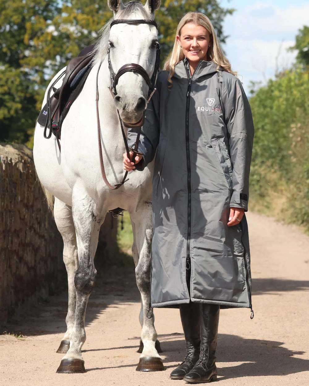 Charcoal Pink coloured Equidry Womens Original All Rounder Waterproof Coat on outdoor background 