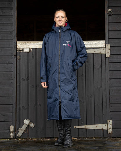 Navy Raspberry coloured Equidry Womens Original All Rounder Waterproof Coat on outdoor background 