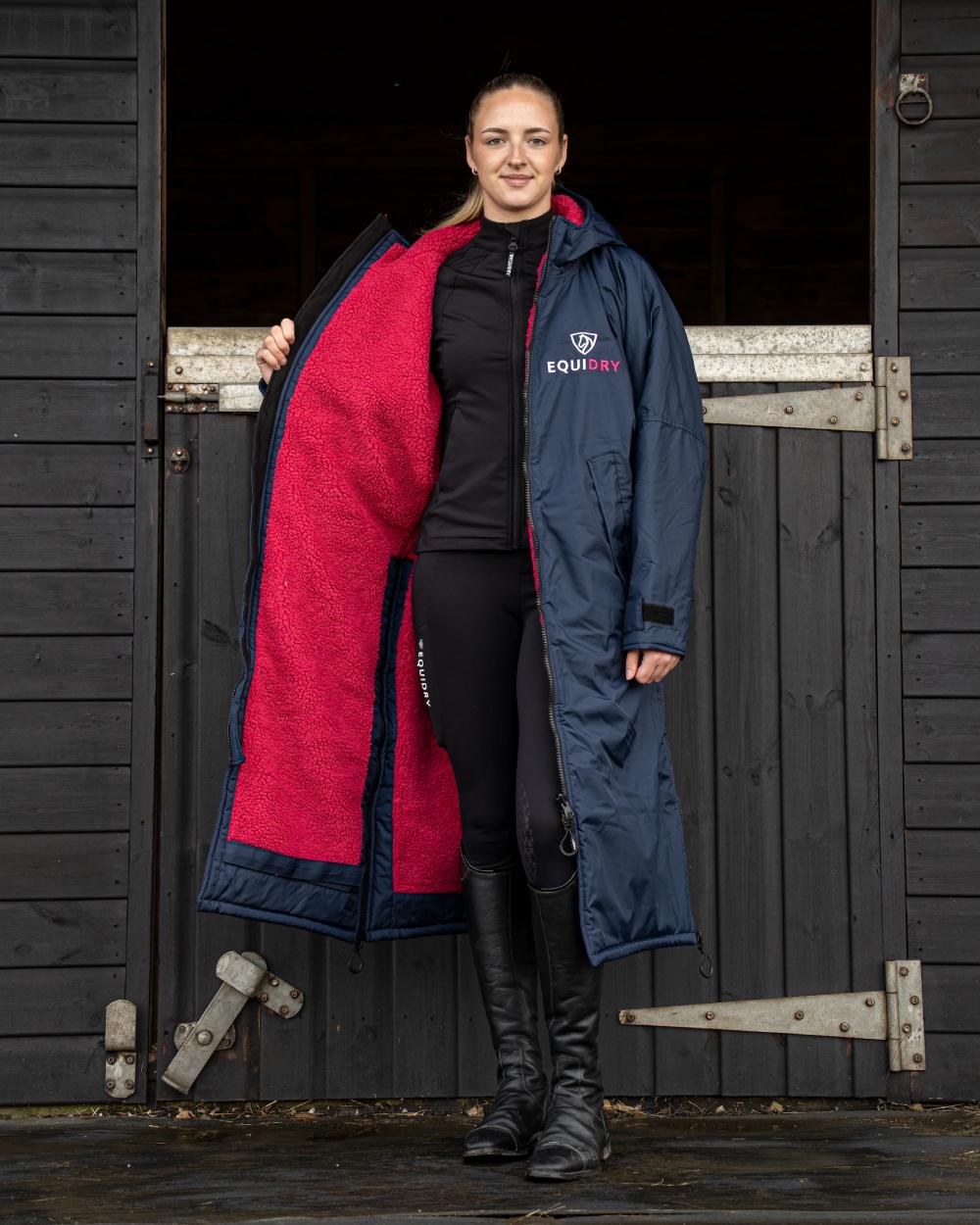 Navy Raspberry coloured Equidry Womens Original All Rounder Waterproof Coat on outdoor background 