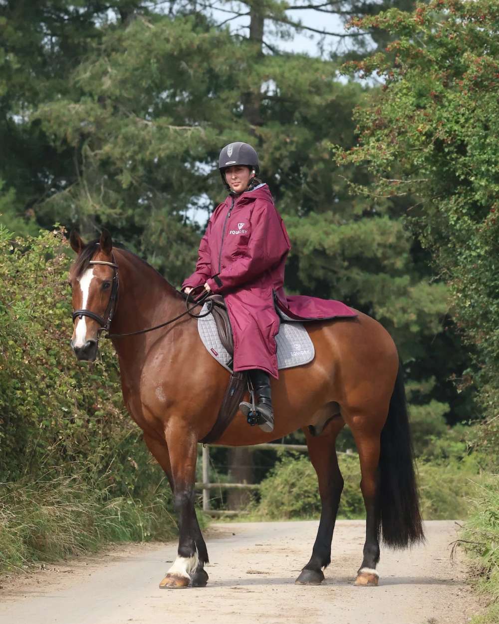 Plum Grey coloured Equidry Womens Original All Rounder Waterproof Coat on outdoor background 