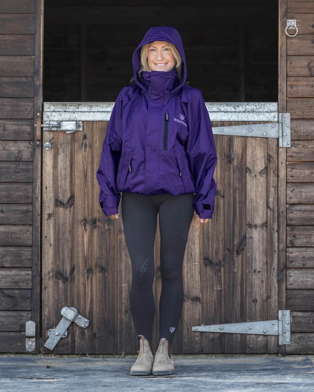 Purple coloured Equidry Womens Shortie Mesh Lining Mac on Stable background 