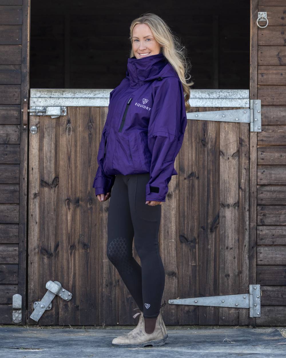 Purple coloured Equidry Womens Shortie Mesh Lining Mac on Stable background 