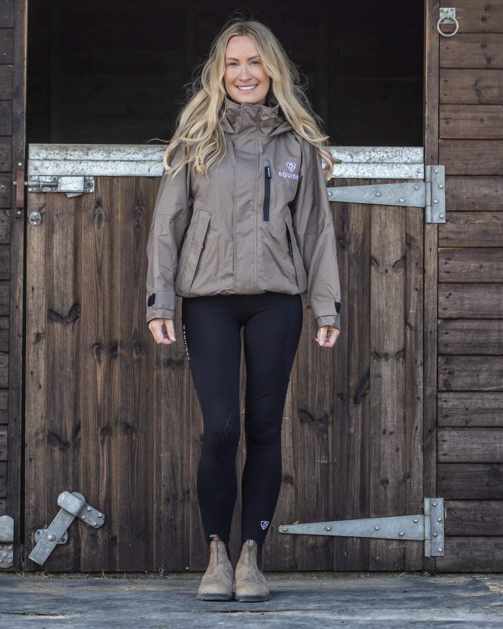 Taupe coloured Equidry Womens Shortie Mesh Lining Mac on stable background 