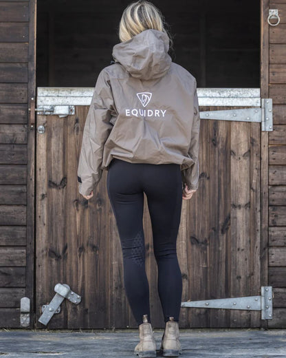 Taupe Equidry Womens Shortie Thin Fleece Jacket With Stowaway Hood on outdoor background 