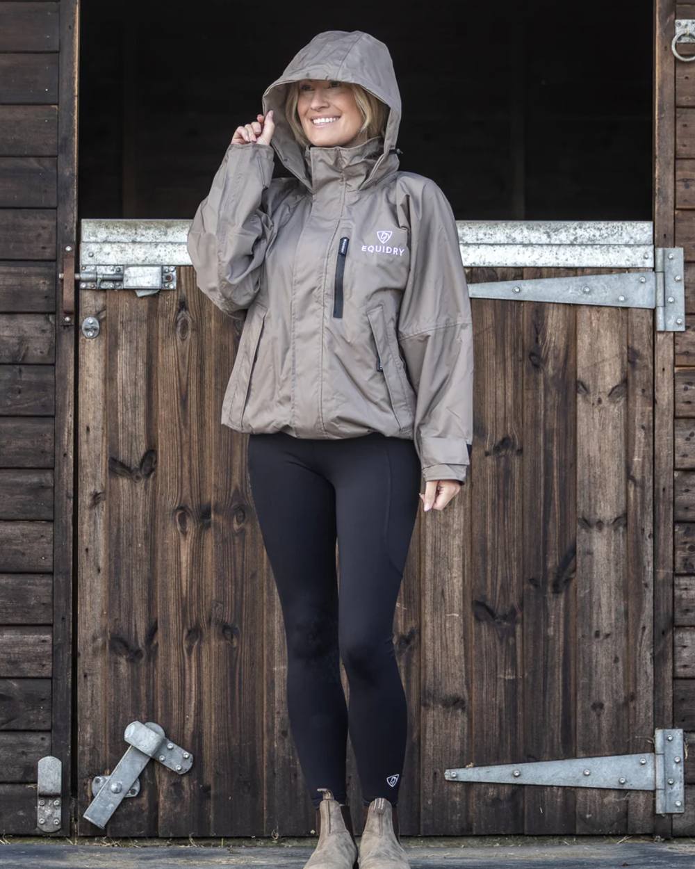 Taupe Equidry Womens Shortie Thin Fleece Jacket With Stowaway Hood on outdoor background 