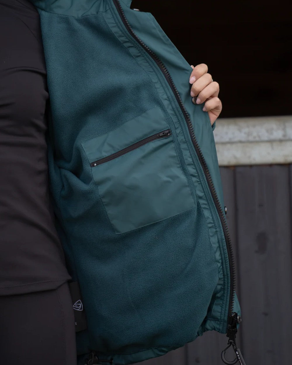 Teal Equidry Womens Shortie Thin Fleece Jacket With Stowaway Hood on outdoor background 