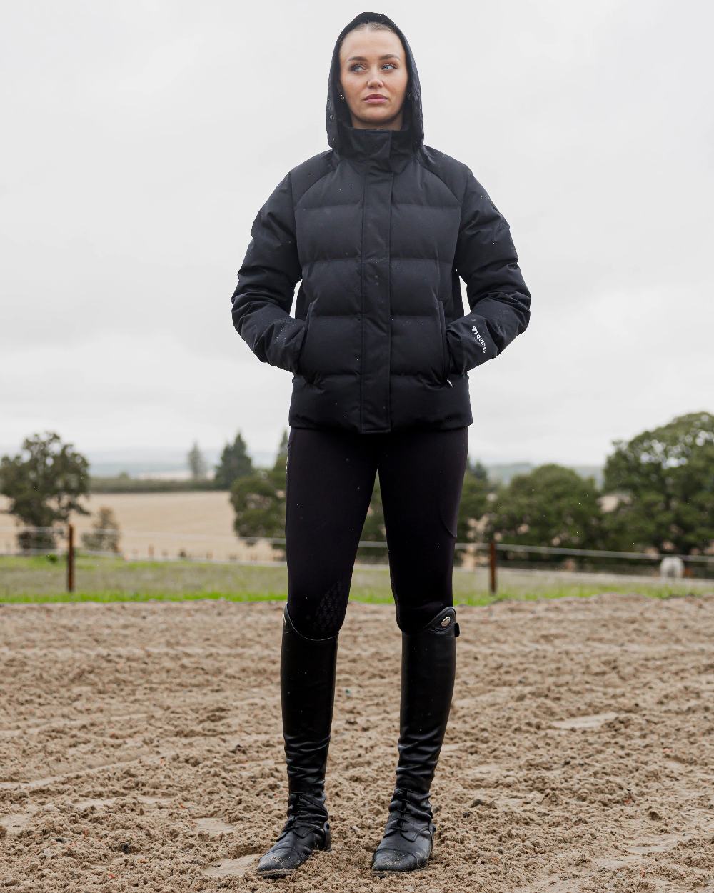 Black Coloured Equidry Womens Talia Waterproof Puffer Jacket on outdoor background 