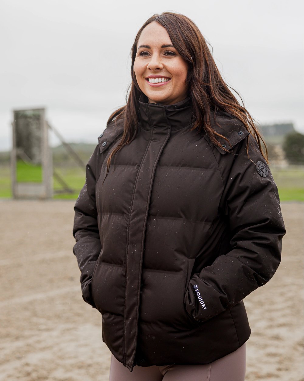 Brown Coloured Equidry Womens Talia Waterproof Puffer Jacket on outdoor background 
