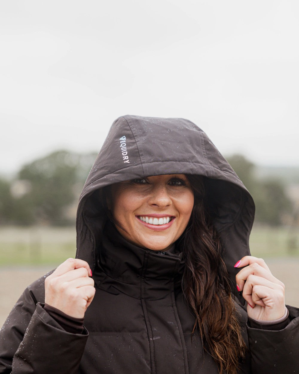 Brown Coloured Equidry Womens Talia Waterproof Puffer Jacket on outdoor background 