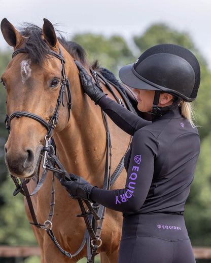 Black Lilac Coloured Equidry Womens Water Repellent Base Layer on outdoor background 